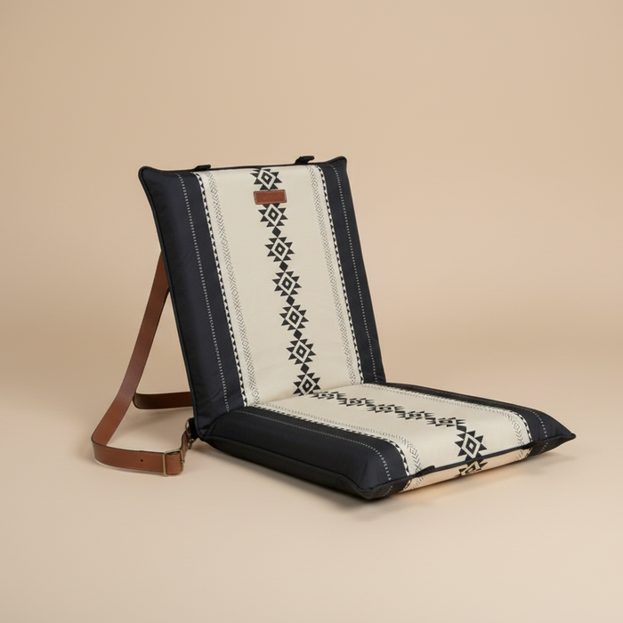 Floor chair pad with intricate Sadu patterns on a beige background